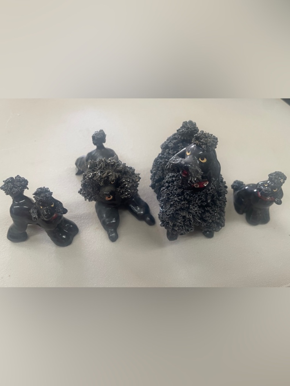 Set of 4 Black Spaghetti Poodles Ceramic Figurines